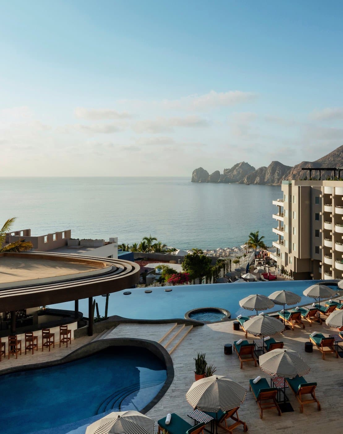 Multi-level view of pool, seating area and beach at Corazon Cabo Resort and Spa