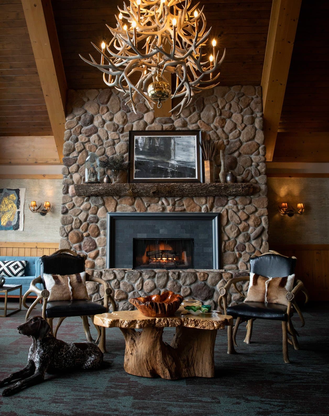 Seating area in front of a fireplace at The Edgewater