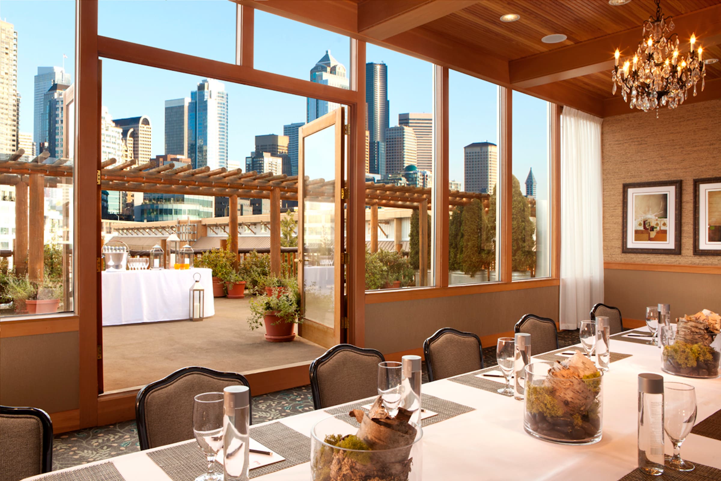 Dining area with access to outdoor area at The Edgewater Hotel in Seattle, Washington