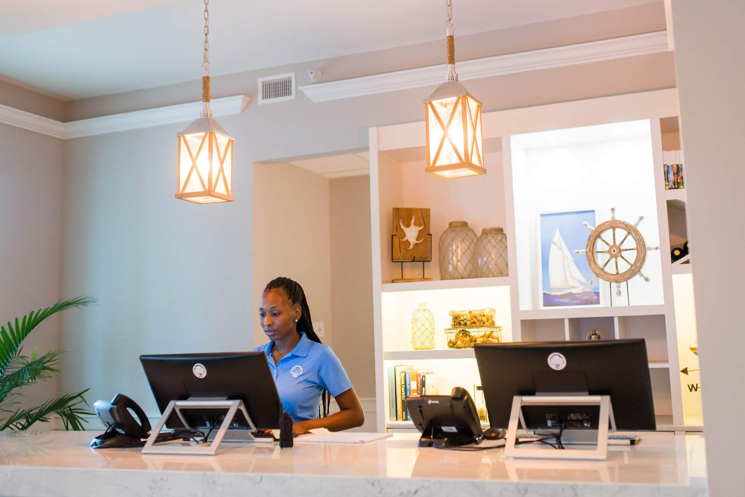 A receptionist at Jekyll Ocean Club Resort.