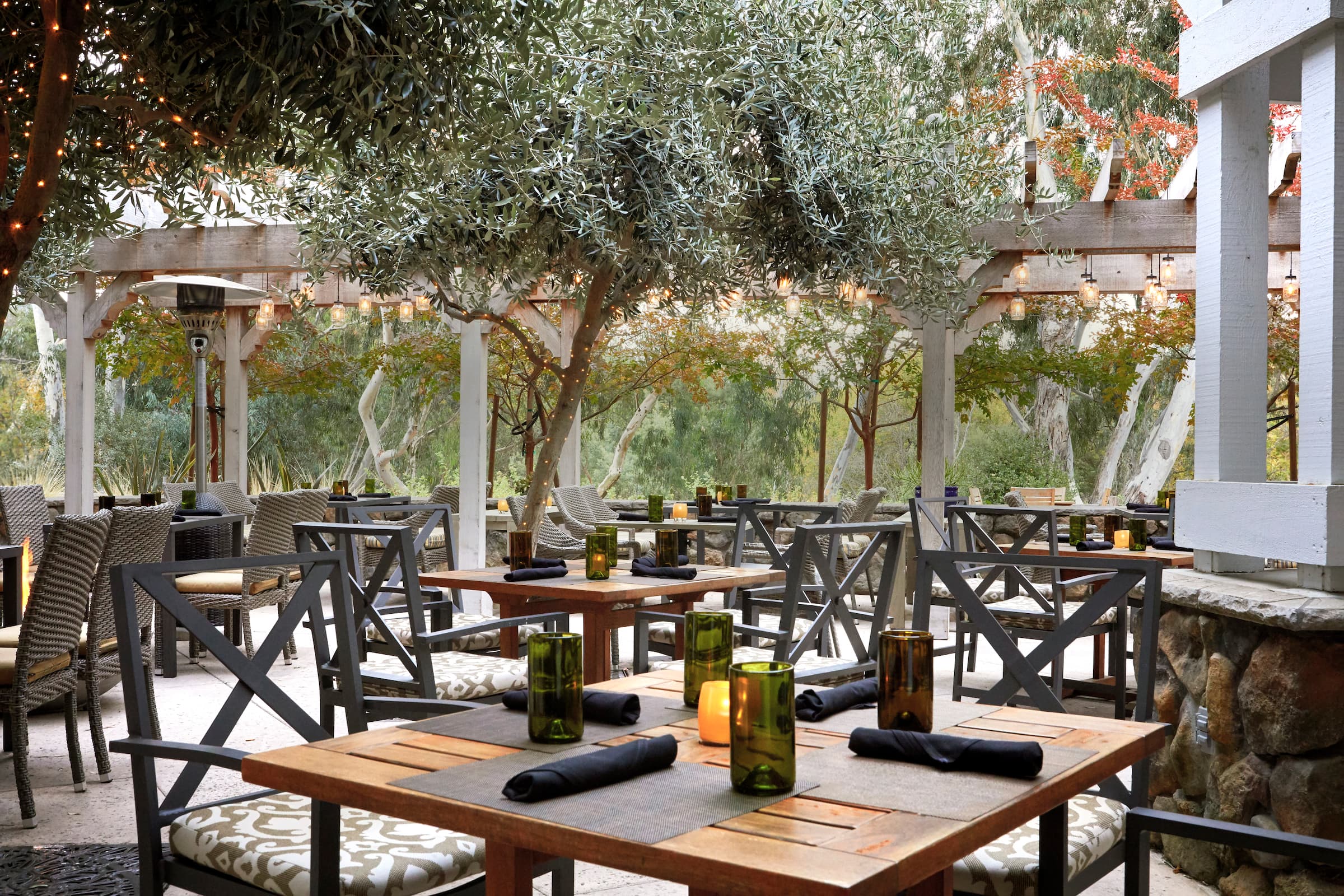 Outdoor dining area at ALBA Bar and Café at River Terrace Inn in Napa, California