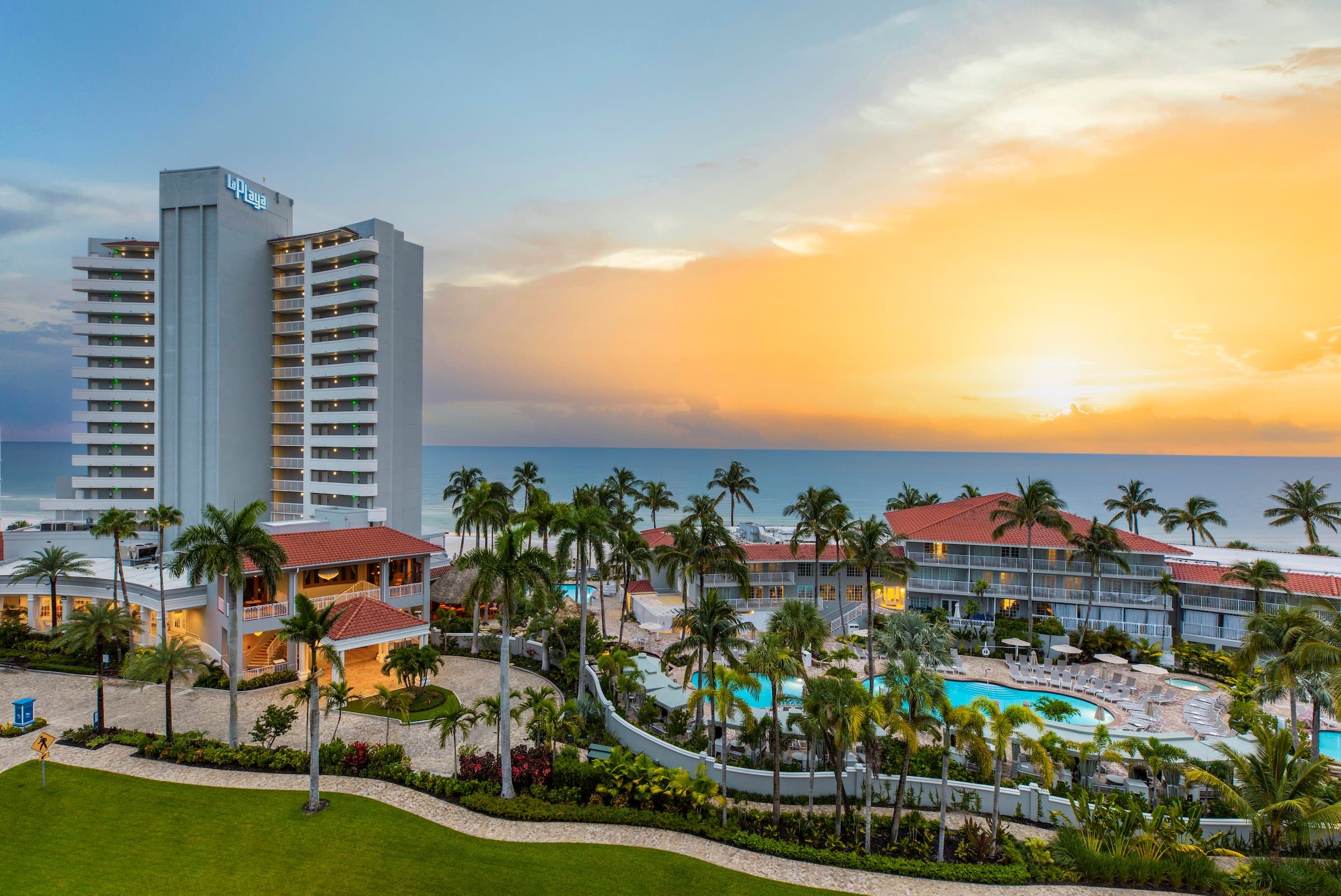 aerial view of LaPlaya Beach & Golf Resort properties during sunset in Naples, Florida