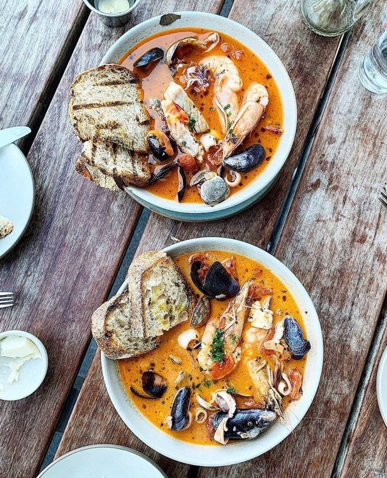 Two bowls of Cioppino from Hog Island Oyster Co. in the San Francisco Bay Area