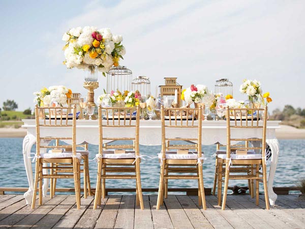 Wedding setup table and chair on marina dock