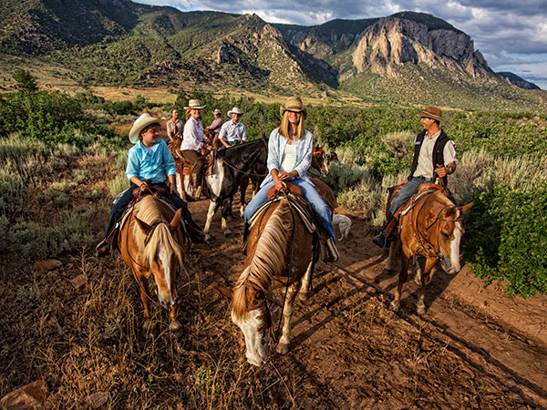 Group Horseback Riding At Gateway Canyons.