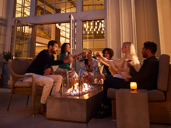 Friends Around The Firepit At River Terrace Inn.