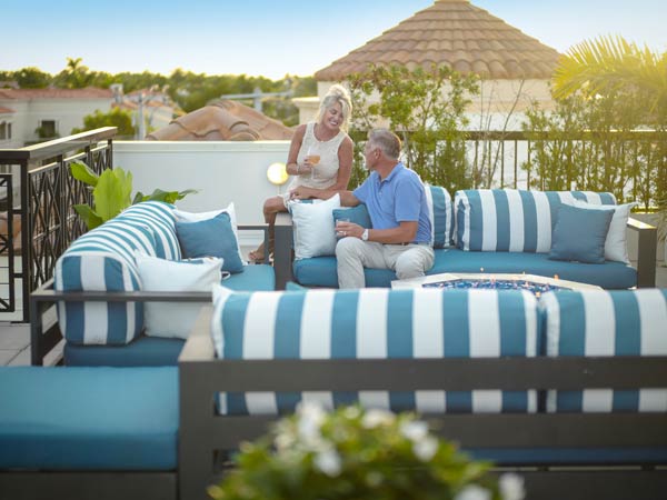 Couple Sitting On Couches.