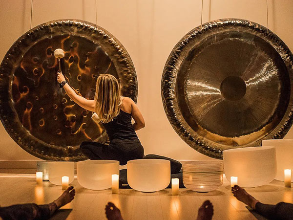Lady Doing A Sound Bath